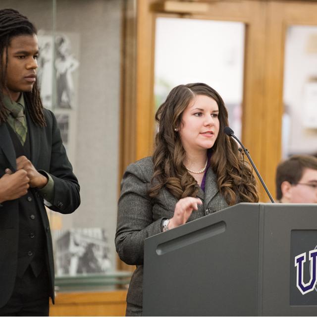 Students engage in a debate competition
