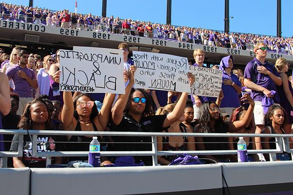 A group of TCU students participated in a silent demonstration during the National Anthem.